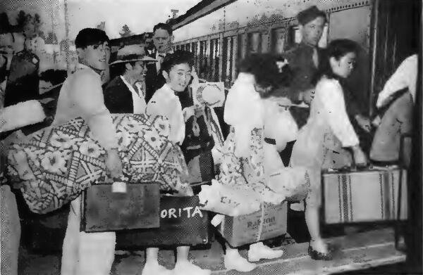 A group boarding the train at Portland (Oregon) Assembly Center