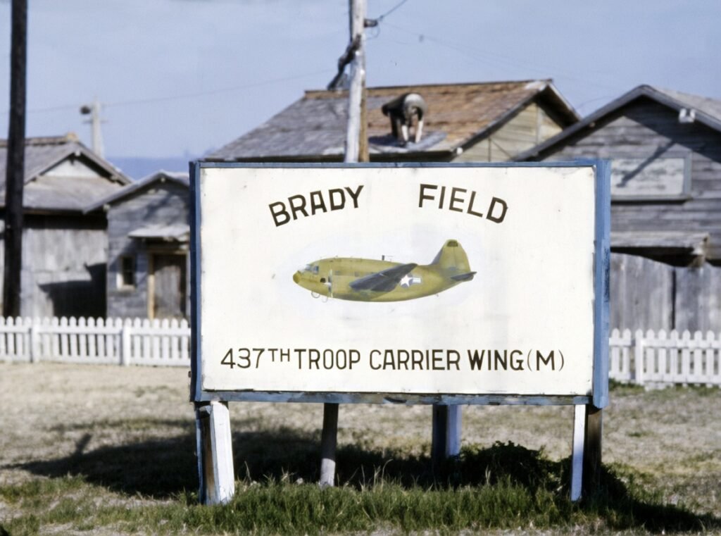 MATHERS_Brady_Field_437th_TCW_sign_1952_GrokAI_rendition